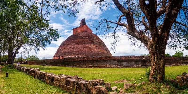 Historic brick stupa and monastery landscape in Anuradhapura
