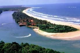 Bentota River meeting the coastline in Sri Lanka